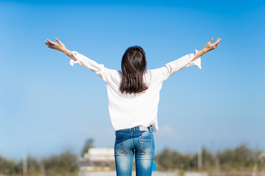 Asian Woman Cheering Open Arms